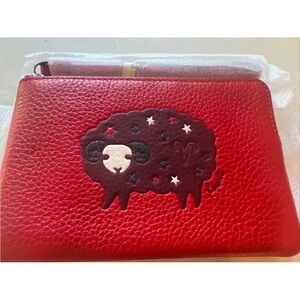 NWT Coach “Aries” Corner Zip Wristlet